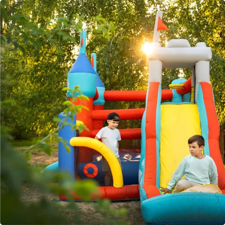Kids sliding on inflatable